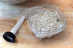 A funnel and casings soaking to be made into sausage