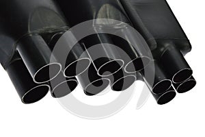 Funnel looking black rubber shrinkable cable breakout boots of various diameters, white background