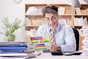 The funny accountant bookkeeper working in the office