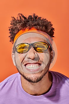 funny african american fella in eyeglasses photo