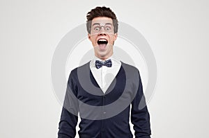 Funny amazed nerd man with mouth opened