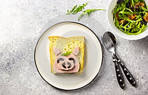 Funny animal sandwich for kids shaped cute pig with boiled sausage and olives