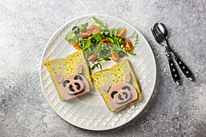 Funny animal sandwich for kids shaped cute pig with boiled sausage and olives