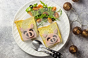 Funny animal sandwich for kids shaped cute pig with boiled sausage and olives