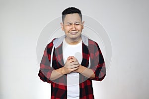 Funny Asian man crying hard, sad depression frustration hopeless expression