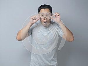 Funny Asian Man Shock With Open Mouth
