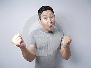 Funny Asian Man Shows Surprised Happy Expression