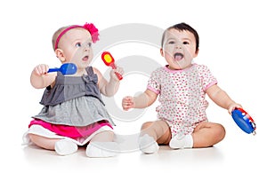 Funny babies girls play musical toys