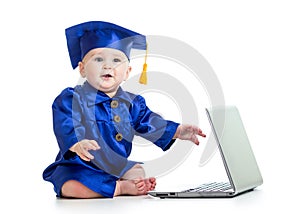 Funny baby in academician clothes with laptop