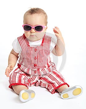 Funny baby girl wearing sunglassess