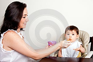 Funny baby messy eater