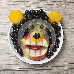 Funny bear made with currant, apple and kiwi
