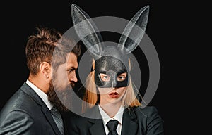 Funny bearded man and woman in carnival rabbit mask. Sweet lovely attractive adorable charming cheerful positive girl in