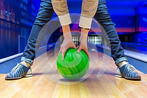 Beginner aiming to bowling pins photo