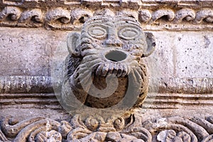 A funny being architectural detail on Peruvian church