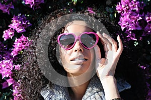 Funny black girl with purple heart glasses