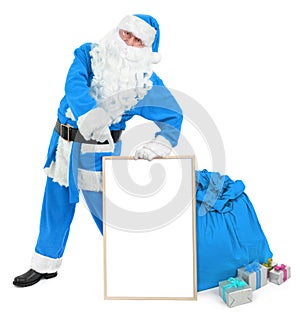 Funny blue Santa with empty white board