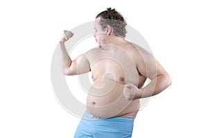 Funny bodybuilder. Fat man. White background. Isolated
