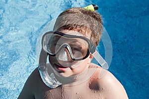 Funny boy with diving goggles