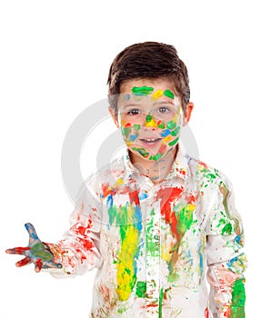 Funny boy with hands and face full of paint