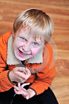 Funny boy making face