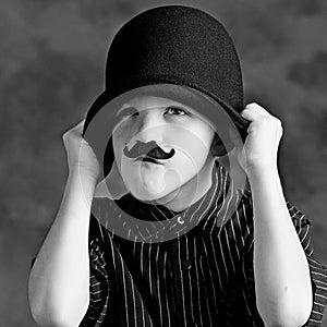 Funny boy with moustache photo