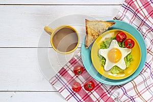Funny Breakfast with star-shaped fried egg, toast, cherry tomato
