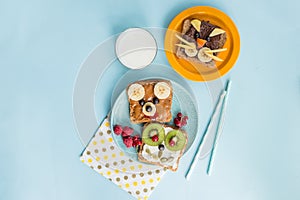 Funny breakfast toast for kids shaped as cute cat, dog, bear, fish. Food art sandwich for child. Isolated. Animal faces toasts