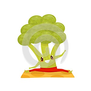 Funny broccoli doing yoga exercise on a mat, sportive vegetable cartoon character vector Illustration on a white