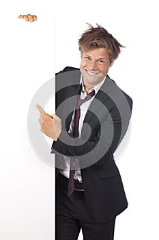 Funny business man pointing at a white board