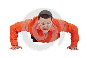 Funny businessman doing push-ups