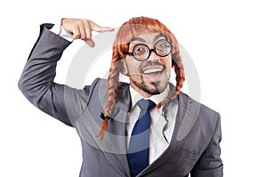 Funny businessman with female wig isolated