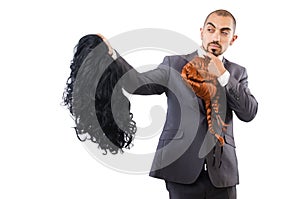Funny businessman with female wig isolated