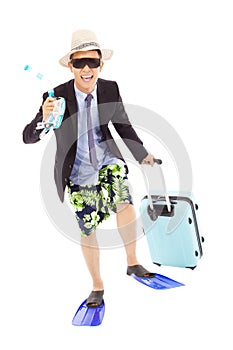 Funny businessman holding scuba gearing and baggage