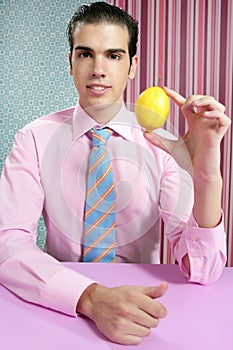 Funny businessman with lemon fruit on hand