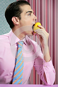 Funny businessman with lemon fruit on hand