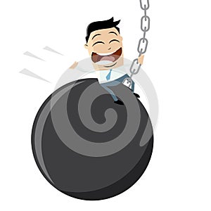 Funny businessman swinging on a wrecking ball