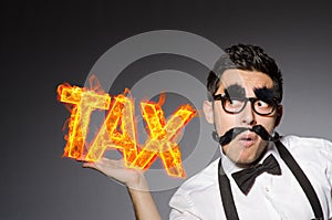 The funny businessman in tax business concept