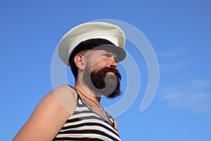 Funny captain sailor wearing hat. Seaman fun. Portrait of serious captain. Bearded sailor, seaman.