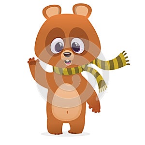 Funny cartoon brown bear in a skarf smiling and waving hand. Vector illustration of a bear mascot character.