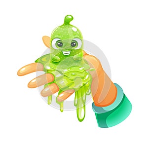 Funny cartoon green slimy character sitting on the hand. Cute slime toy.