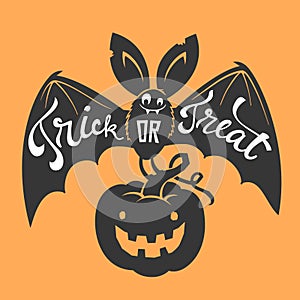 Funny cartoon smiling bat with spread wings and Trick or Treat lettering carrying carved Halloween pumpkin against