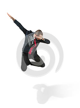 Funny cheerful businessman jumping in air over white background