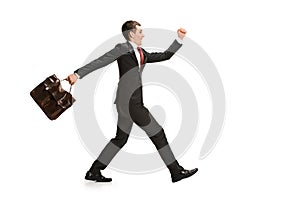 Funny cheerful businessman over white background