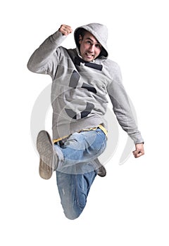 Funny cheerful happy man jumping in air over white background