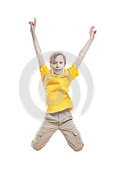 Funny cheerful little child jumping and laughing