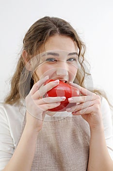 funny cheerful teen girl young woman biting red pepper healthy eating delicious food cooking salad sincerely sly look