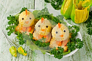 Funny chickens from eggs on the Easter table