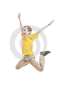 Funny child in colorful t-shirt jumping and laughing