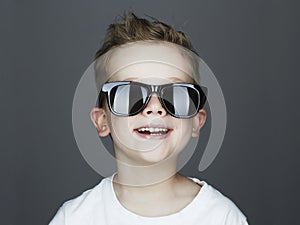 Funny child.fashionable little boy in sunglasses